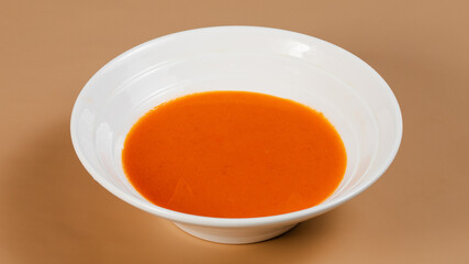 Tomato soup bowl isolated view