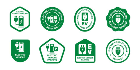 Green electric vehicle parking signs and icons for charging stations