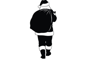 Silhouette of santa claus walking away carrying a large sack of presents on christmas eve