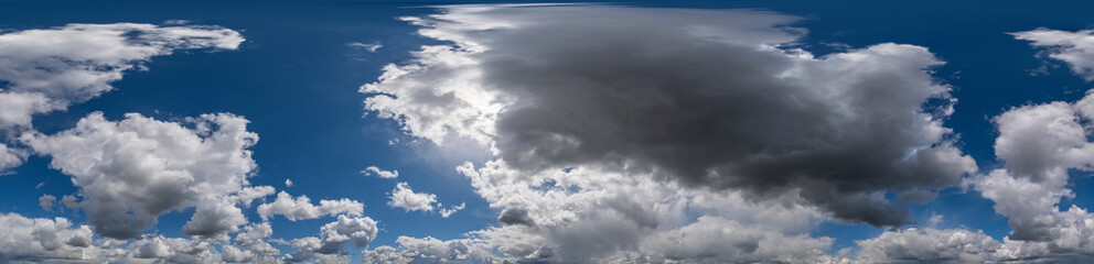 seamless hdri 360 panorama of dark blue sky before sunset with awesome storm clouds for use in 3d graphics or game development as skydome replacement or edit drone shot © NastyaPhoto