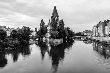 Metz, Lorraine region, France: The New Temple church on the banks of river Moselle at twilight in black and white