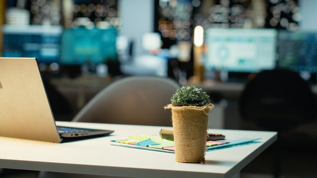 Professional empty office features computers and forecasting equipment. Modern space set for corporate planning, analytics and performance indicators that drive organizational success. - Powered by Adobe