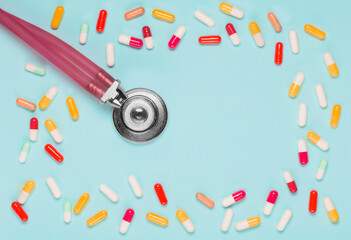 medical pills background white, yellow top view and phonendoscope