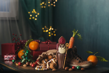 Saint Nicholas Day background with gifts and shoe