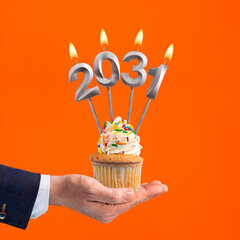 Happy New Year 2031 - Candles in the form of lit numbers