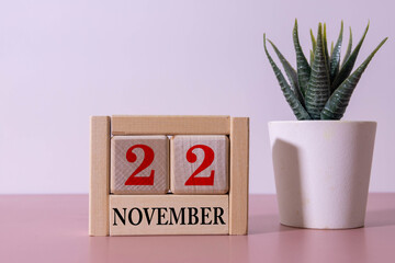 Wooden calendar organizer with date november 22