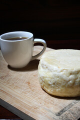 Traditional brazilian breakfast, minas cheese and coffee.