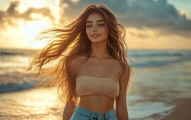Smiling woman with long hair on a beach at sunset