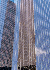 Obraz premium Glass exterior background. Architecture. Building exterior architecture. Building background. Glass backdrop building. Architectural detail. Background of architecture. Modern glass background