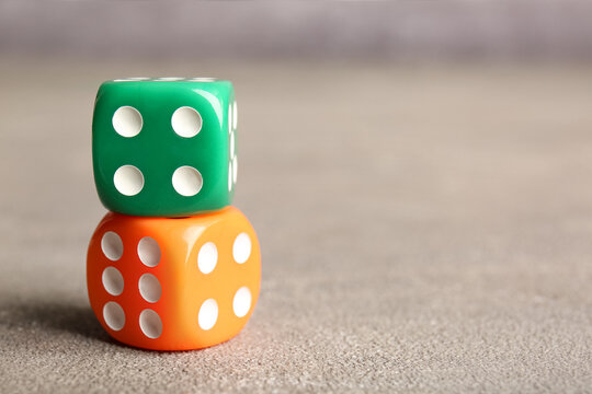 Different dices on grey background