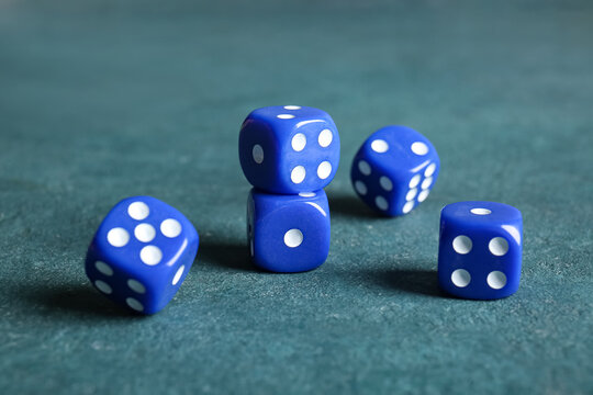 Blue dices on color background