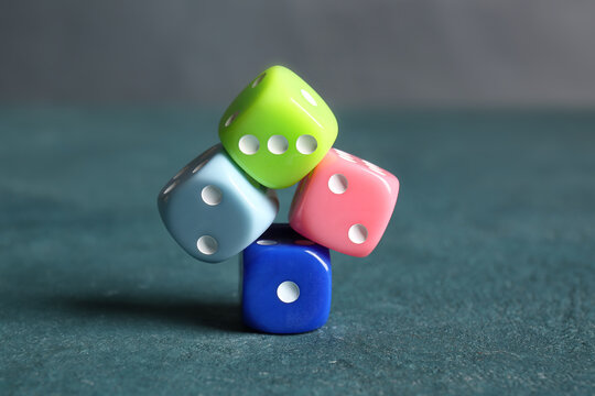 Different dices on color background