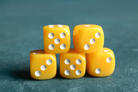 Yellow  dices on color background