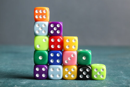 Different dices on color background
