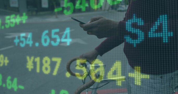 Standing man holding bike handlebar using smartphone at city crosswalk, with financial graphics