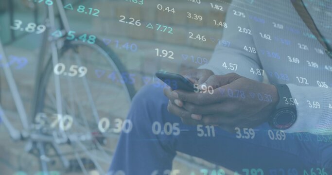 Holding smartphone businessman checking translucent market ticks on deck, with bicycle leaning - Powered by Adobe