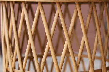 Texture of wicker table on brown background, closeup