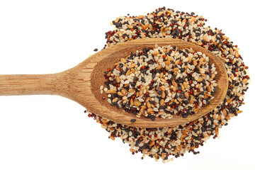 Detail of colorful tricolor quinoa in wooden spoon on white background