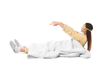 Female sleepwalker with blanket lying on white background
