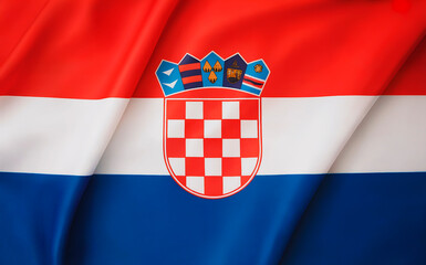Naklejka premium A photograph of the Croatian flag displayed as a full background, featuring three horizontal stripes in vivid red, white, and blue from top to bottom. The flag's distinctive coat of arms sits prominen