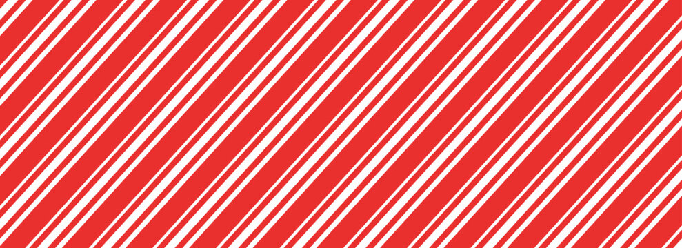 Fototapeta Christmas candy cane striped seamless pattern. Christmas candycane background with red stripes. Caramel diagonal print. Xmas traditional wrapping texture. Vector illustration.Eps10