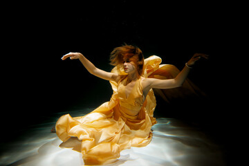 Elegance in Motion A Mystical and Enchanting Underwater Dance Performance and Artwork