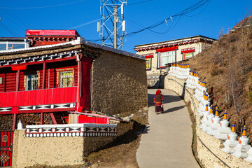Traditional tibetan village right next to Muya Temple, located in Lhagang Township, Kangding City,...