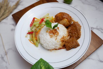  nasi rames , catering box , food service ( rice, beef rendang, chicken, chili, vegetables). close up view. Nasi Uduk, Nasi Warteg