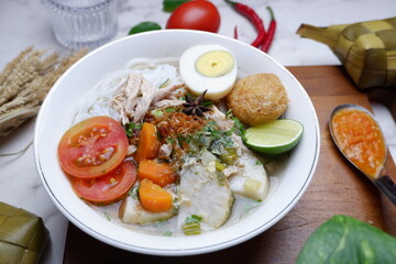 Soto Banjar is traditional dish from Banjarmasin, Indonesia. The delicacy of Soto Banjar, typical in South Kalimantan, has a taste like chicken soup, served with chicken, boiled egg and, carrot etc
