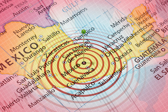 A needle into Mexico political map with an earth waves and a seismograph lines in an eartquake composition background