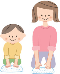 雑巾掛けをする親子