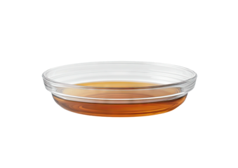 Clear bowl filled with amber liquid