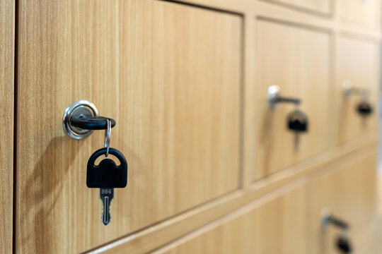 Wooden locker with hanging keys for deposit box in public facilities and services, personal storage