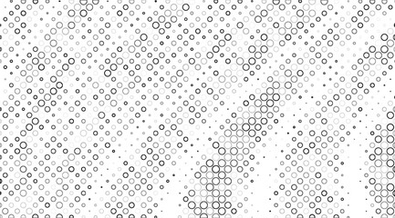 A grayscale halftone pattern featuring various sizes of circles and dots arranged diagonally across a white background, creating a modern and visually dynamic texture effect