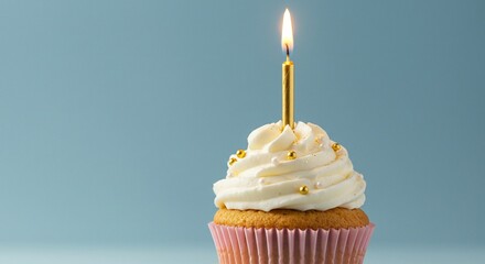 Celebrate a special occasion with a beautifully frosted cupcake and a flickering candle.