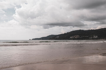 Patong Beach Phuket with turquoise blue water white sand Thailand.