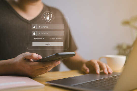 User typing login and password at home, secure access to the personal information and big data. cyber security, the digital crime concept, and data protection from hackers.