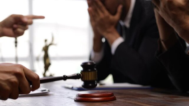 Stressed businessman and lawyer experiencing emotional breakdown, displaying intense disappointment and frustration after losing significant legal case, sitting dejectedly in professional office.