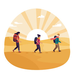 Three people hiking in the desert at sunset.