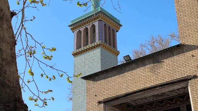 Islamic architecture with Persian design in Tehran Iran historic landmark of royal Golestan Palace Qajar era blue tile minaret culture heritage ancient mansion tourism Middle East outdoors