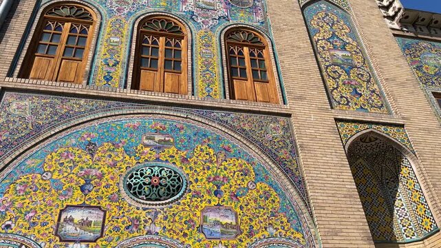 Wooden old fashion decorative door and window in Persian house Golestan Palace Tehran vintage design ceramic tile mosaic decoration historic landmark architecture culture tourism traditional travel