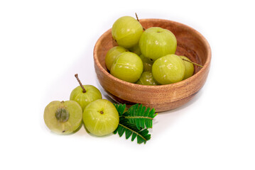 Flat lay of Amla (Indian gooseberry) powder with fresh fruits isolated on white background. Herbal