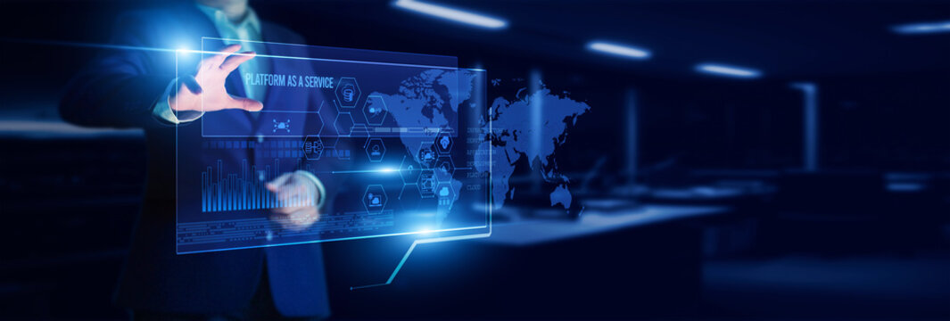 Cloud architect pointing to a platform as a service interface with analyzing scalability, integration speed, application performance, and deployment efficiency metrics.