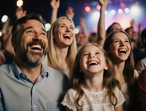Excited family cheering and enjoying live music at a vibrant concert event | music, family, events, entertainment, celebration theme - Powered by Adobe