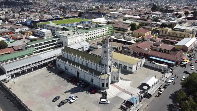 San Nicolas Church, in the background part of the Mario Camposeco Stadium in Quetzaltenango, Guatemala