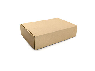 close up of single plain brown cardboard box. closed and isolated on white background