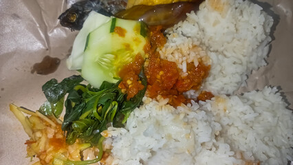 fried fish and rice with chili sauce 