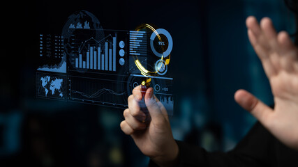A person interacting with a futuristic holographic data analytics interface displaying graphs and charts, symbolizing innovation and advanced technology in business analytics. Scalp