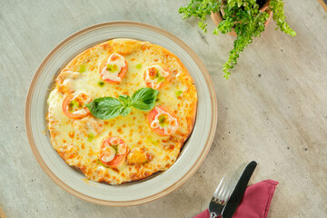 A Delicious Pizza With Fresh Ingredients on a Plate