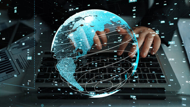 A person types on a laptop while a digital globe overlay symbolizes global connectivity and technology in a modern business environment, showcasing innovation and analysis. Xenic